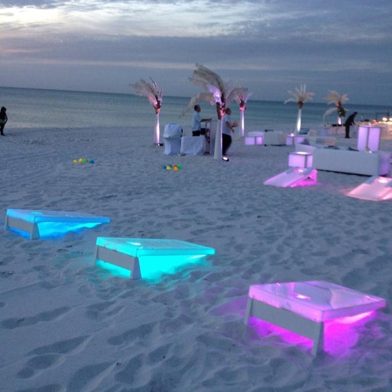 LED Cornhole lit up at night LED Corn Hole Light Up Yard Game Toss Beach