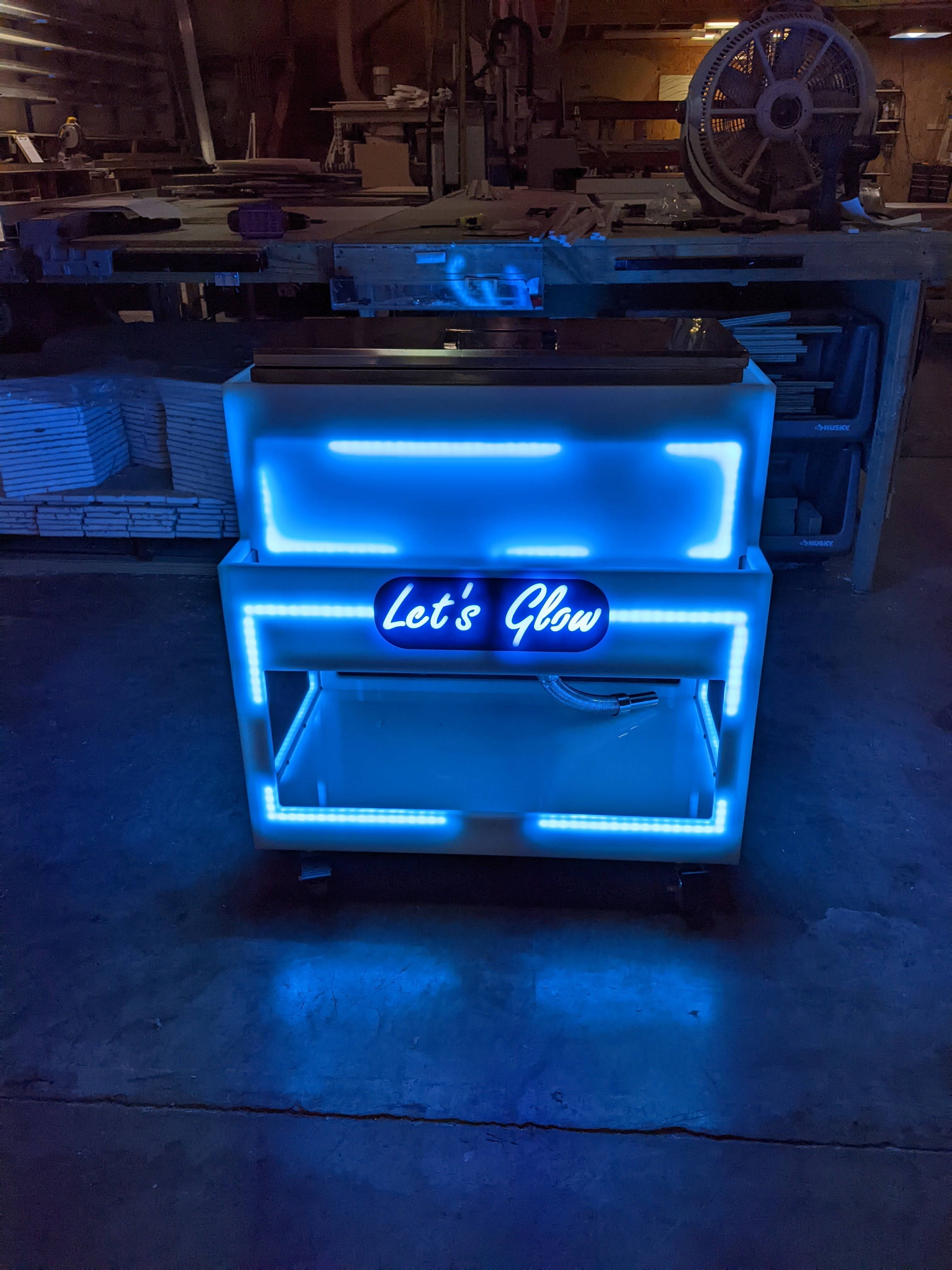 Rear shot of our Rolling drink cart in all blue lighting