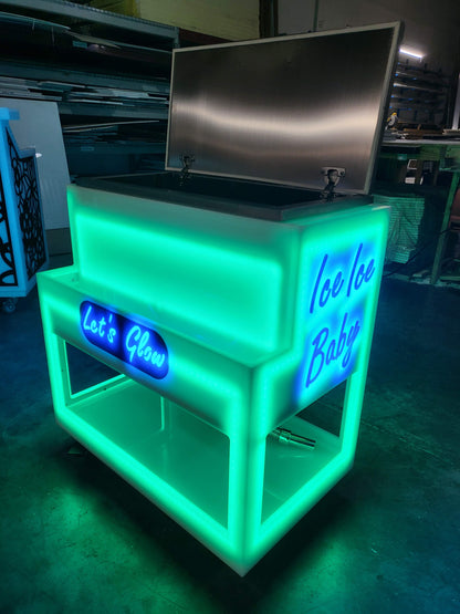 Angle view of our LED ice chest showing ice ice baby and let's glow graphics