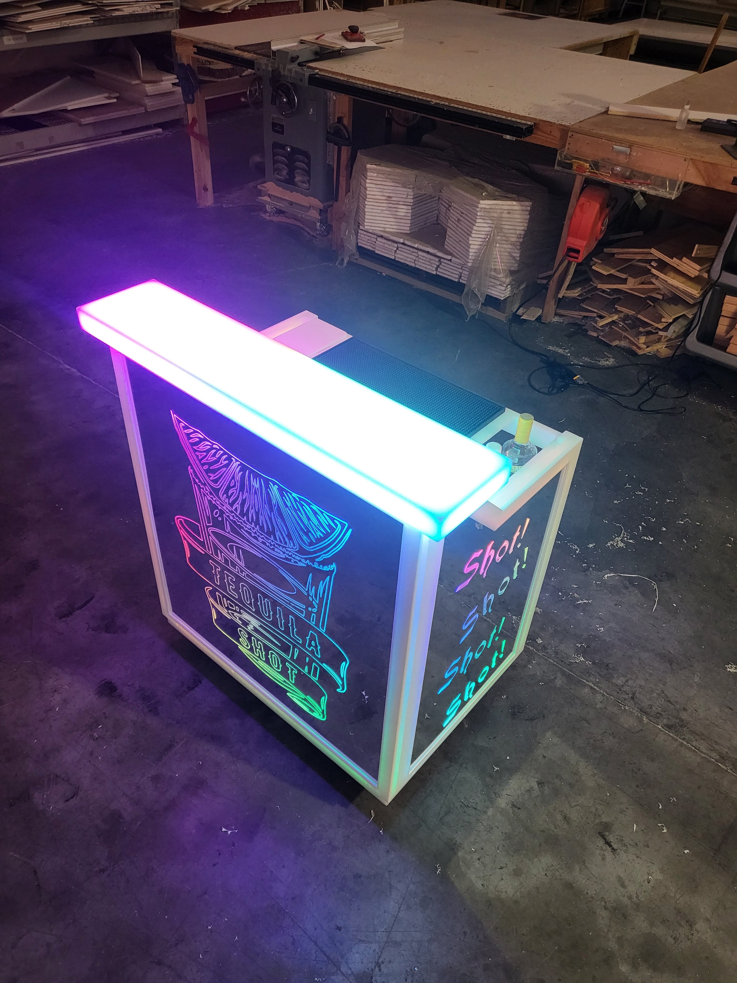 Looking down at customer service deck on portable bar that lights up